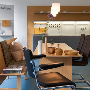 Large contemporary kitchen pantry ideas - Large trendy l-shaped linoleum floor kitchen pantry photo in Dortmund with a single-bowl sink, light wood cabinets, tile countertops and beige backsplash