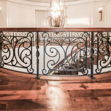 Project #74 | Circular Staircase with Hand-Forged Metal Panels