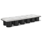 Meridian Furniture - Pavilion Black Boucle Fabric Bench, Cream, Black Finish, 108" W X 31" D X 17.5" H - Bring valuable seating and remarkable style to your space with this cream Pavilion Boucle Fabric Bench, an exquisite balance of style and usability for the entryway, bedroom, and beyond. Crafted from oak veneer with a black finish, this bench has a 4-inch-thick seat cushion that's channel-tufted for a touch of luxury. The bench's columnar bases add a dash of Art Deco design, making it a captivating focal point in any room.