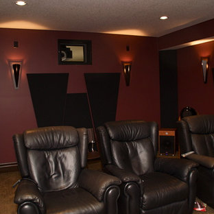 Photo of a medium sized contemporary enclosed home cinema in Toronto with carpet, a projector screen and turquoise floors.