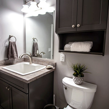 Powder Room with Waypoint Gray Vanity and Linen Cabinet w/ Laminate Countertop