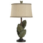 StyleCraft Home Collection - Islamadora palm leaves table lamp with natural linen shade custom trim - The Islamorada table lamp is made using a natural look that draws from vintage South Pacific favorites. It features a dual leaf pattern in grey with a wentworth bronze base and body for a clean finish. Add its beige hardback fabric shade and get an authentic throwback style for the modern home.