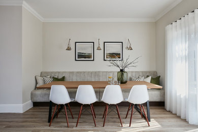 Example of a trendy dining room design in Surrey