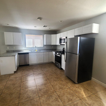 Rent-Ready Kitchen with White Cabinets and Granite