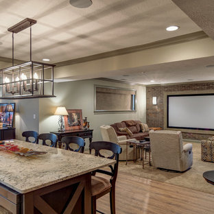 Large elegant open concept carpeted and beige floor home theater photo in Indianapolis with beige walls and a projector screen
