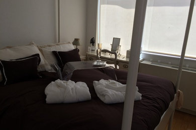 Eclectic bedroom photo in New York