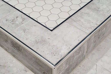 Example of a trendy blue tile ceramic tile and gray floor freestanding bathtub design in Seattle