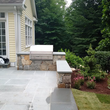 Freestanding stone wall, landscaping, Patio, Grill