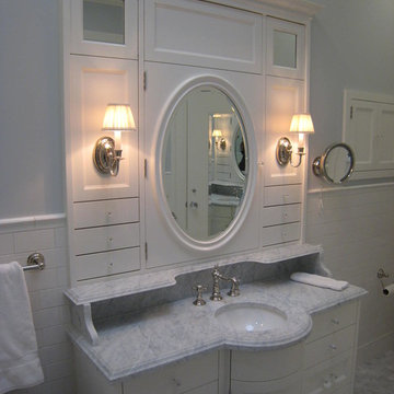 White built in vanity and marble sink
