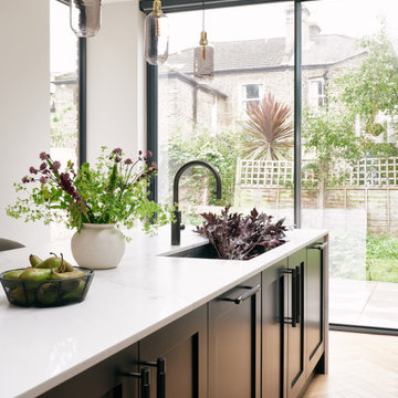 Black Shaker Kitchen with Silver Accents