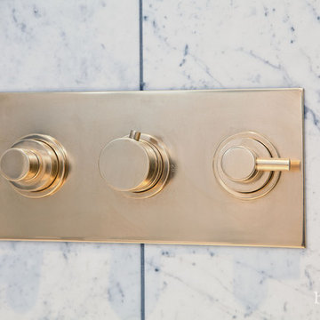 Carrara marble family bathroom with gold finishes - Brighton