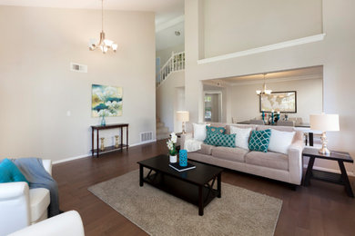 Inspiration for a large contemporary open concept medium tone wood floor and brown floor living room remodel in San Francisco with beige walls, a ribbon fireplace and a brick fireplace