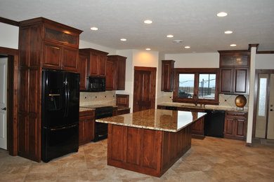 Kitchen - traditional kitchen idea in Other