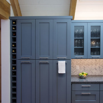 Blue Shaker Cabinets and Wine Rack in Contemporary Kitchen Remodel
