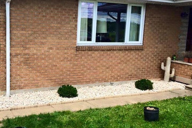 Design ideas for a small southwestern full sun front yard concrete paver landscaping in Other for summer.