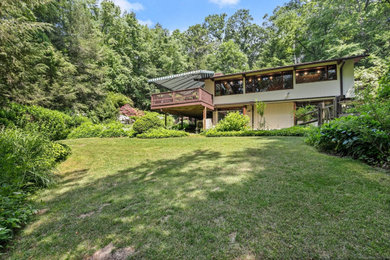 Example of a 1960s exterior home design in New York