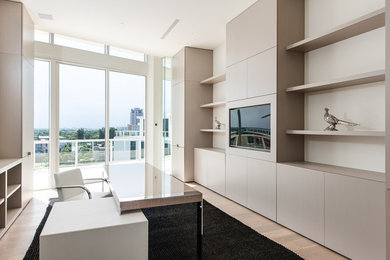 This is an example of a contemporary home office in Miami.