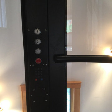 Round Acrylic Home Elevator Incorporated into Staircase
