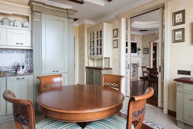 This is an example of a mid-sized traditional home design in Moscow.