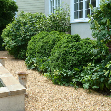 Pea Gravel front courtyard with pool and fountain