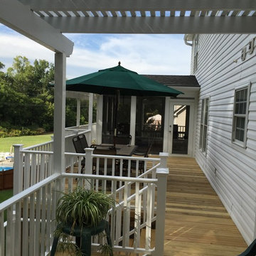 Clemmons, NC Eze Breeze Window Room with Double White Aluminum Pergolas.