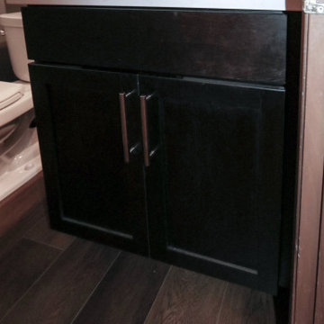 Powder Room with Onyx Vanity with Antique White Quartz Countertop