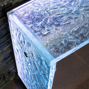 Glass table with LED lights in luxurious residential condo