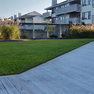 Ground View of Wooden Decking and Grass