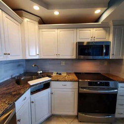 Kitchen space with sleek cabinets - Products