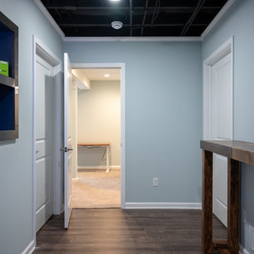 Finished Basement with. Golf Simulator, Bar and Gym in Canton, MI