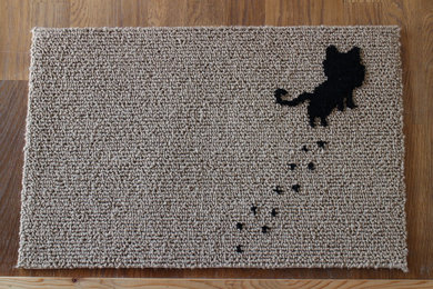A Cat walking On Rug