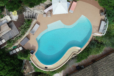 Projet de plage de piscine en revêtement drainant | Résineo