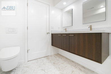 Alcove shower - mid-sized modern white tile and ceramic tile ceramic tile, white floor and double-sink alcove shower idea in San Francisco with flat-panel cabinets, dark wood cabinets, a wall-mount toilet, white walls, an undermount sink, quartz countertops, a hinged shower door, white countertops and a floating vanity