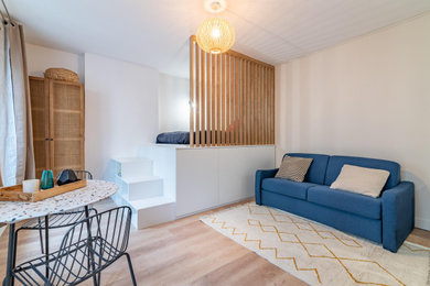Medium sized contemporary bedroom in Paris.