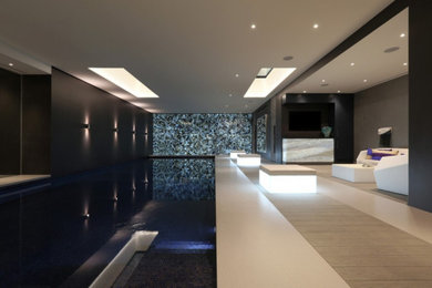 Modern indoor private and rectangular swimming pool in London.