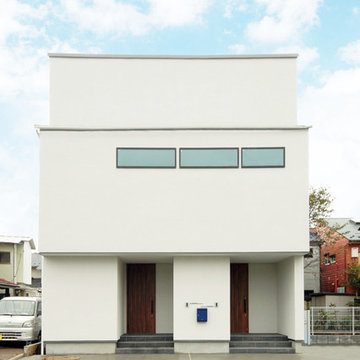 中庭がつなぐ二世帯住宅