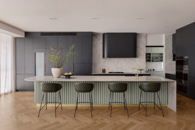This is an example of an expansive contemporary kitchen in Melbourne.