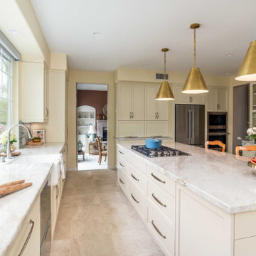 San Diego Coastal Kitchen with Oversized Island and Brass Lighting