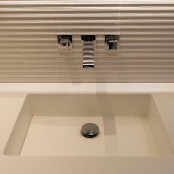 Griferia empotrada con bancada de mueble en krion