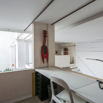 Bodega convertida en dos apartamentos dúplex. Arq.: Ramón Gómez