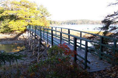 Example of a mid-sized exterior home design in Portland Maine