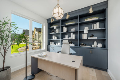 Example of a transitional home office design in Other