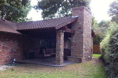 Example of a mountain style patio design in Dallas