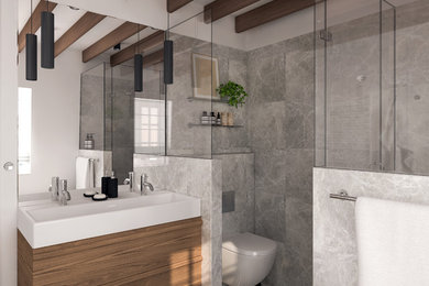 Photo of a mid-sized contemporary master bathroom in Other with medium wood cabinets, a freestanding tub, a corner shower, a wall-mount toilet, gray tile, marble, white walls, marble floors, grey floor and a hinged shower door.
