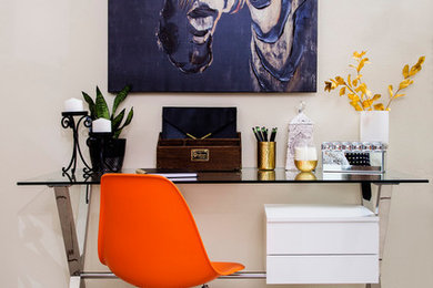 Inspiration for a transitional ceramic tile living room remodel in New Orleans with beige walls