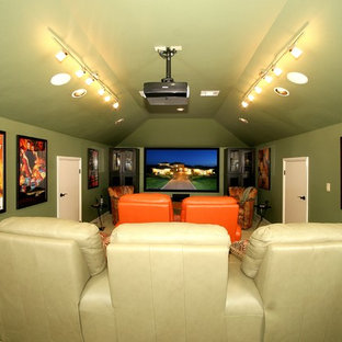 Design ideas for a bohemian enclosed home cinema in Austin with green walls, carpet and a projector screen.