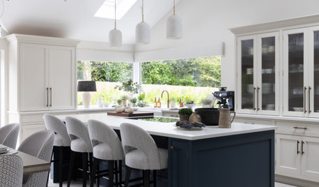 White-and-Navy English Kitchen With Cleverly Zoned Storage