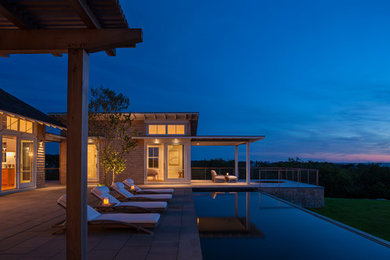 Example of a beach style exterior home design in Providence
