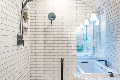 Mid-sized minimalist master white tile and ceramic tile ceramic tile, black floor, double-sink and vaulted ceiling bathroom photo in Seattle with shaker cabinets, distressed cabinets, a two-piece toilet, white walls, an undermount sink, quartz countertops, a hinged shower door, white countertops and a built-in vanity