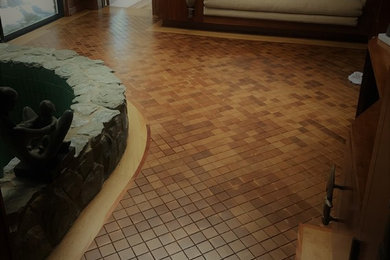 Inspiration for a mid-sized transitional enclosed light wood floor and beige floor family room remodel in Detroit with beige walls
